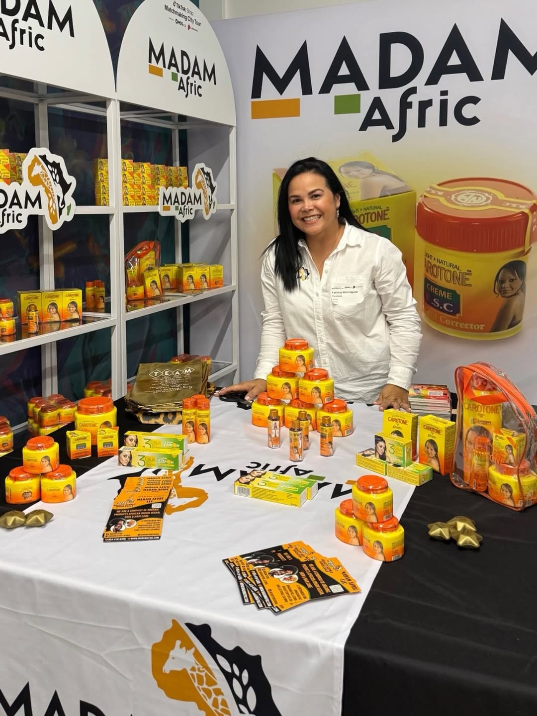 woman with madam afric prducts 