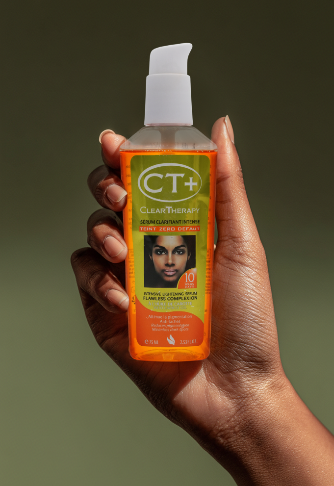 female hand holding ct+ lotion